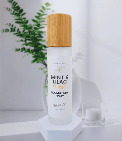 Room and body spray with a wooden cap on a white background