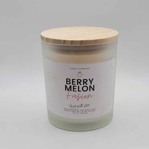 Candle with a wooden lid labeled 'Berry Melon Fusion' on a gray background